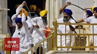 Sikh groups clash with swords at Indias Golden Temple  BBC News [upl. by Ardnahs78]