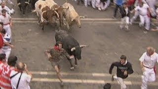 Spains San Fermin bull running festival draws thousands [upl. by Leunamnauj215]