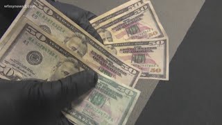 These Counterfeit Bills Are Good Enough To Fool Detection Pens [upl. by Enerehs]