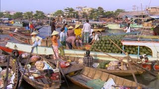 The Mekong Deltas floating marketplace [upl. by Akimit]