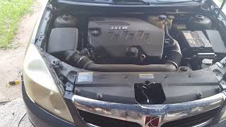 2007 Saturn Aura XE Headlight Bulb Replacement [upl. by Herson]