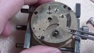 How I install a pocket watch mainspring Elgin [upl. by Deyes]