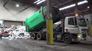 Emptying Gradeall Hook Lift Portable Waste Compactor [upl. by Bendix]